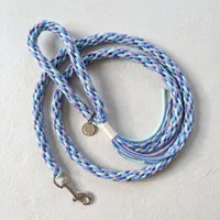 he Traverse Braided Paracord Leash in Arctic Sky, displaying the high-strength braided pattern and decorative tassel end. color:Arctic Sky